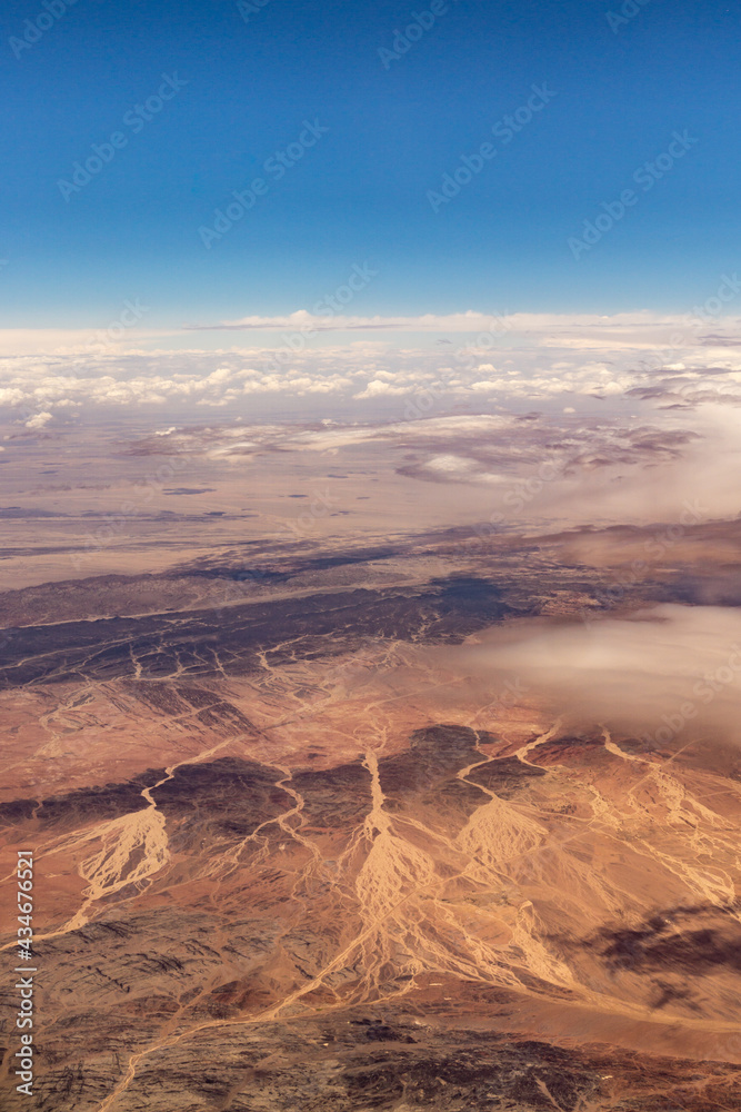 Aerial photos of mountains and snow mountains in Urumqi, Xinjiang Province, China