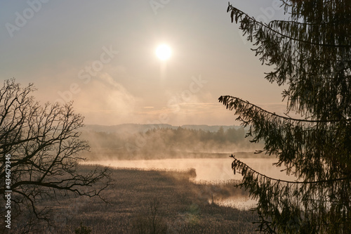 Sonnenaufgang bei Nebel mit Blick über die Osterseen in Seeshaupt nahe dem Starnberger See, Bayern photo