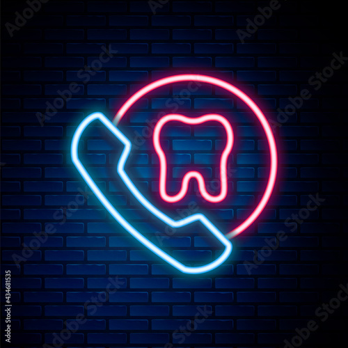 Glowing neon line Online dental care icon isolated on brick wall background. Dental service information call center. Colorful outline concept. Vector