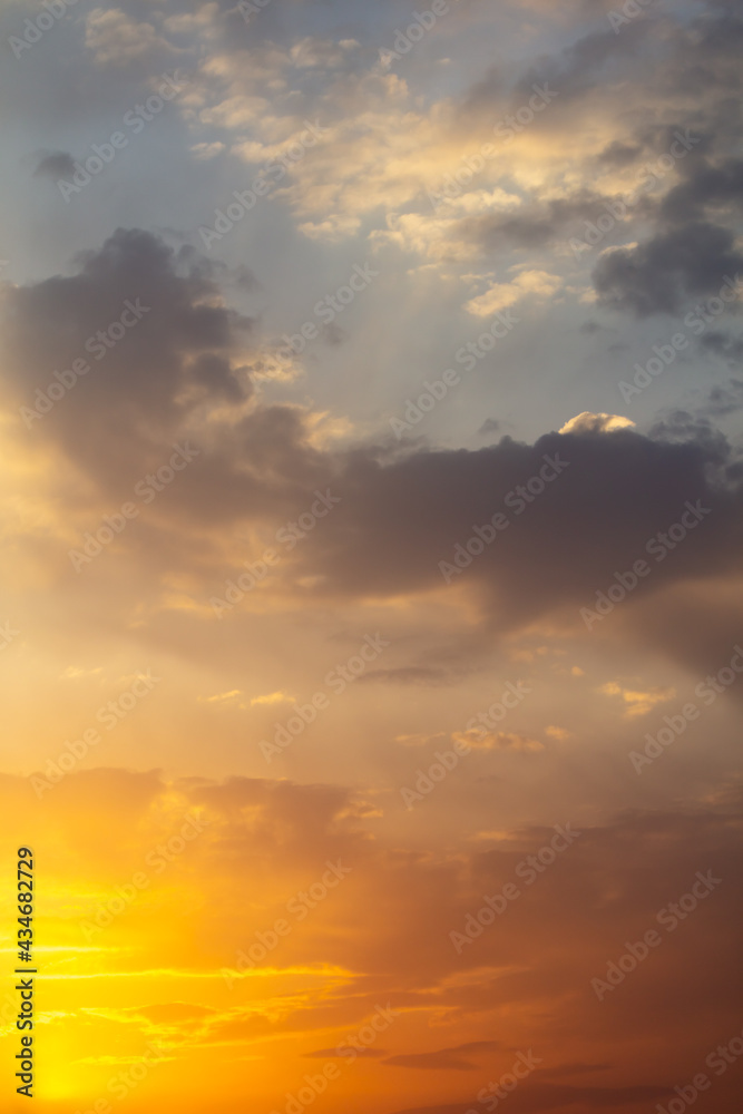 Golden sky with clouds at sunset Golden sky with clouds at sunset