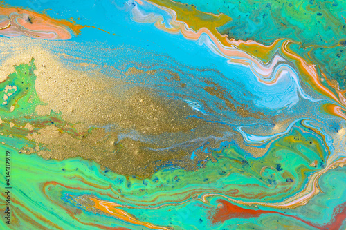 Marble blue and green abstract background in sea style. Liquid pattern with golden glitter.