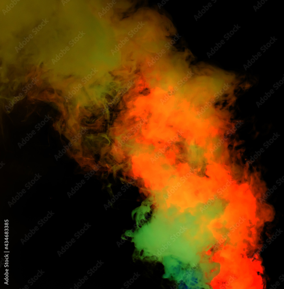 Red and green smoke on a black background. Red and green smoke on a black background.