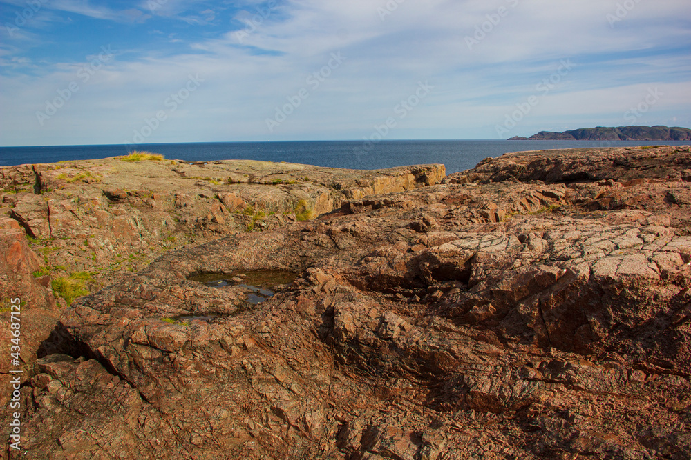 Stone coast of the Arctic Ocean, Teriberka, Murmansk region. Scenery background.