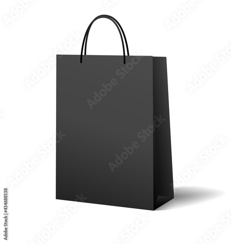 Black shopping bag (plastic or paper bag) isolated on white background. Blank mockup design useful for shop merchandise, delivery, selling