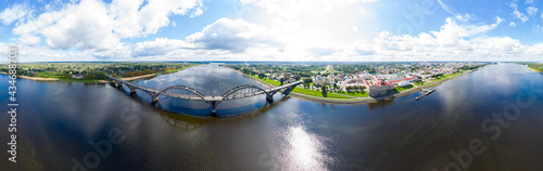 Rybinsk, Russia. View of the embankment of the city of Rybinsk and the bridge over the Volga River. Aerial photography. Panorama 360