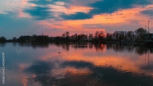 Beautiful sunset with reflections near Plattling, Isar, Bavaria, Germany