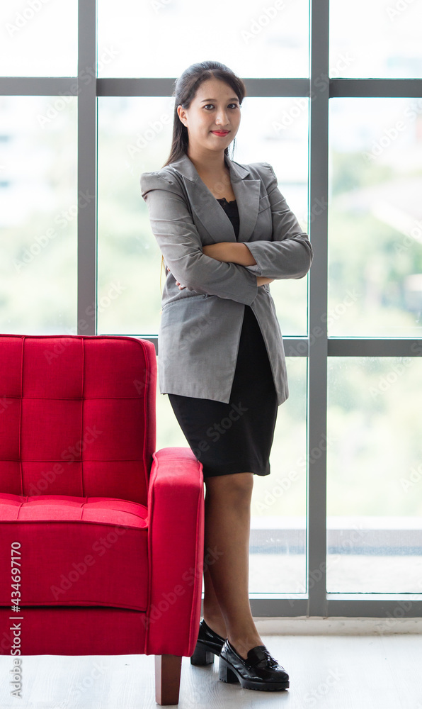 Stylish businesswoman in modern office lounge Stylish businesswoman in modern office lounge