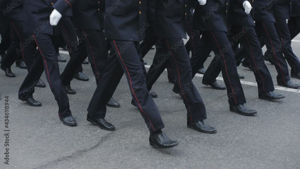 Close-up of the legs of the military, who march on the parade Close-up of the legs of the military, who march on the parade