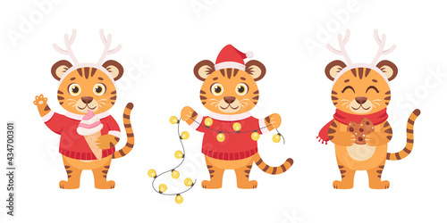 Fototapeta Naklejka Na Ścianę i Meble -  Set of cute tigers with ice cream, garland, ginger cookie. Year of the Tiger. Merry Christmas and Happy New Year 2022. Vector illustration