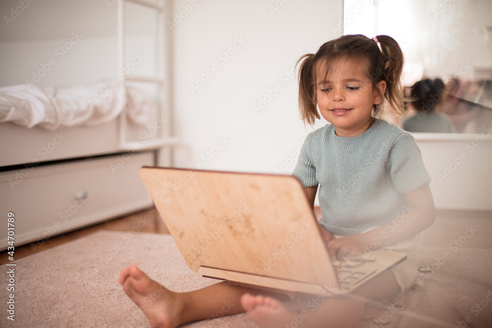Toddler playing interactive games for good development at home. Toddler playing interactive games for good development at home.