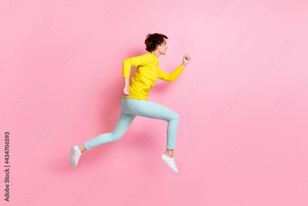 Full length body size photo of model jumping high running fast on sale isolated on pastel pink color background