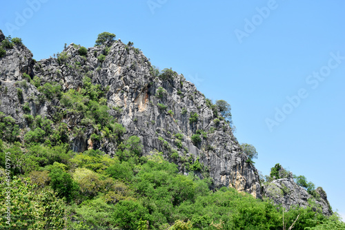 Limestone mountains on white background