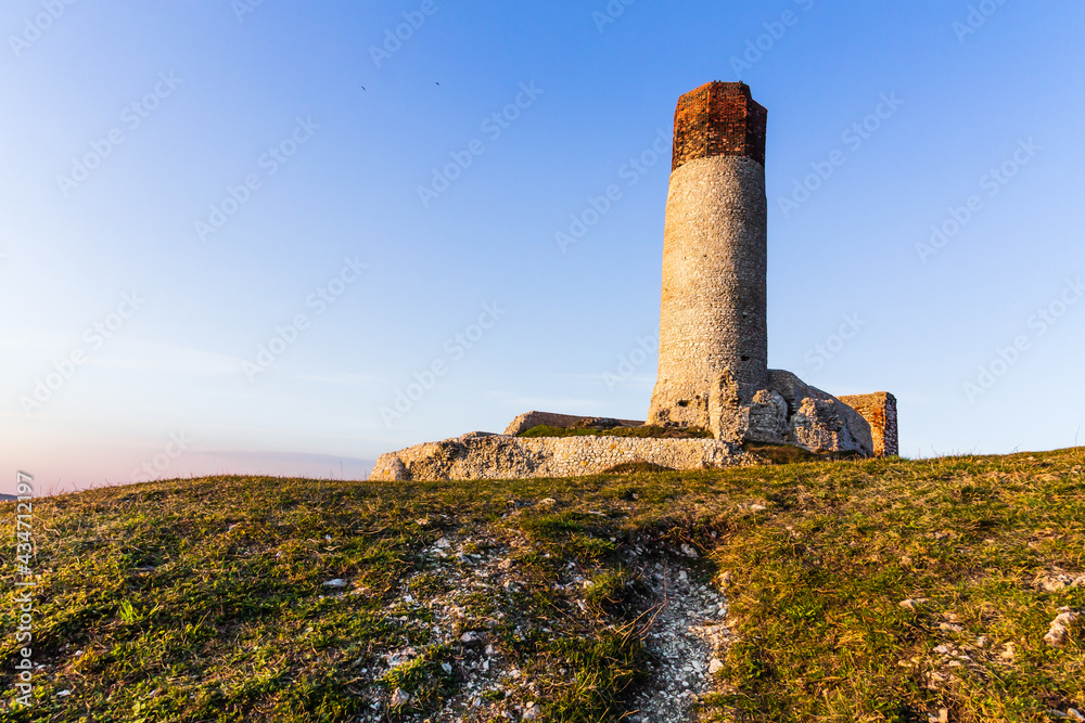 Ruins of medieval royal castle on the limestone rocks, Olsztyn Poland. Krakow-Czestochowa Upland, the Polish Jurassic Highland