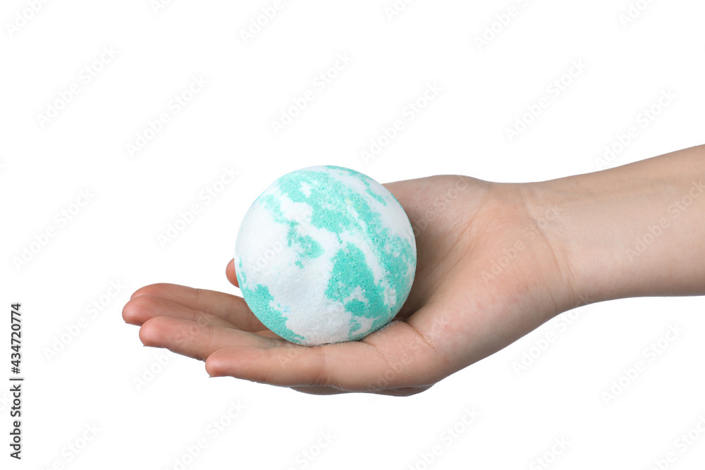 Woman holding bath bomb on white background, closeup Woman holding bath bomb on white background, closeup