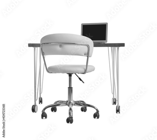 Stylish workplace with laptop and comfortable chair on white background