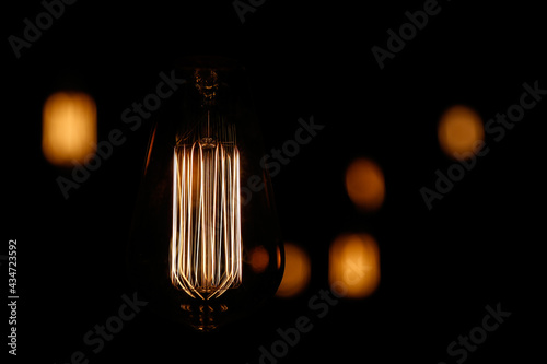 old electric lamp in dark scenery