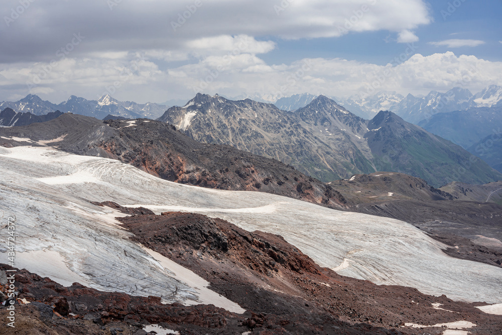 Panoramic view of the Elbrus glacier, named GaraBashi. In the foreground we can see the 2 tongues of GaraBashi glacier. Southeast side of Elbrus. Altitude 3800 m. July 2020