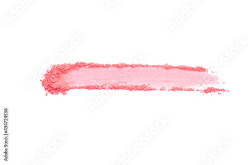 Crushed pink coral eyeshadow swatch isolated on white background. Sample of beauty make up cosmetics texture products.