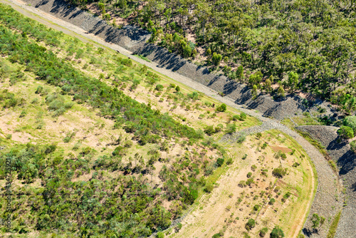 Landfill and strorm water gullies with horses (brumbies) on Curtis Island