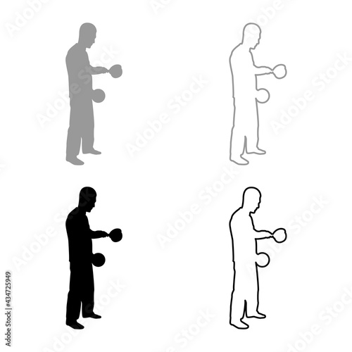 Man with saucepan in his hands preparing food Male cooking use sauciers with open lid silhouette grey black color vector illustration solid outline style image photo