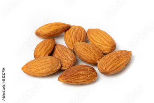 Close-up of almonds on a white background.