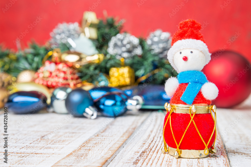 Christmas decorations and gift boxes on wooden board background (Selective Focus)