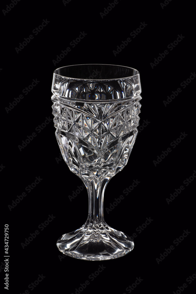 Empty crystal glass isolated on black. Studio shot Empty crystal glass isolated on black. Studio shot