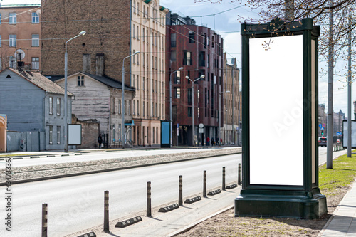 vertical blank billboard on the city street,outdoor advertising mock-up