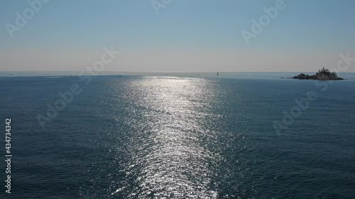 Sea surface is glittering reflects sun lights. Beautiful nature aerial drone footage took with 4K 30fps.