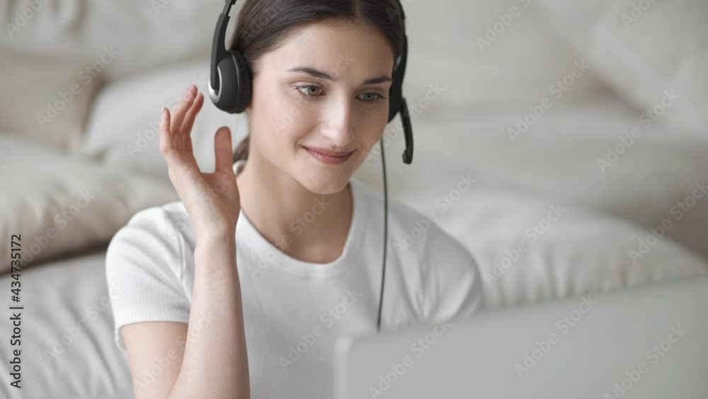 Woman in headset web cam consultant talking blogger Woman in headset web cam consultant talking blogger