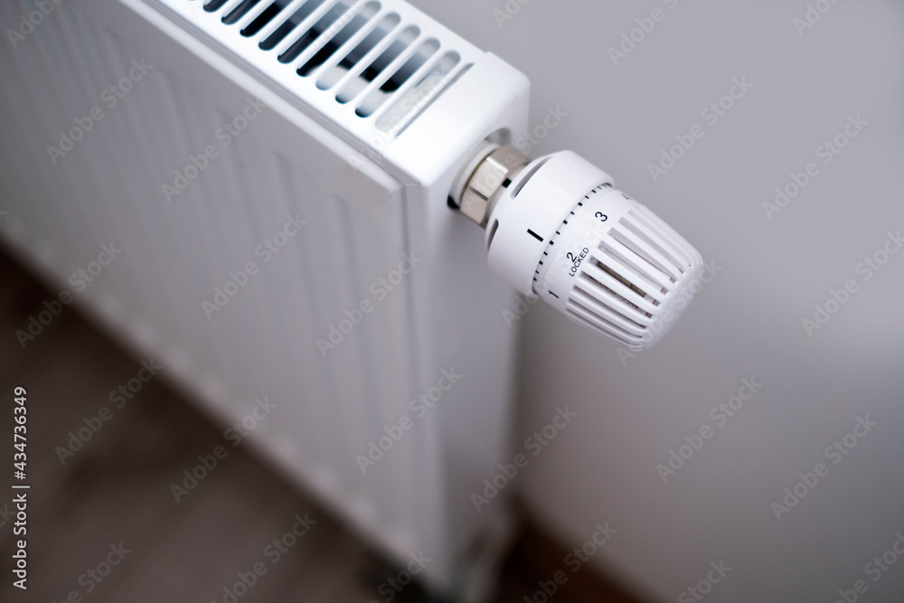 white radiator switch close up white radiator switch close up