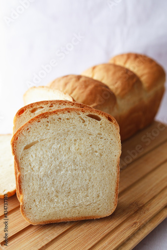 Japanese milk bread asian food. Sliced loaf as sandwich, home baking during qurantine