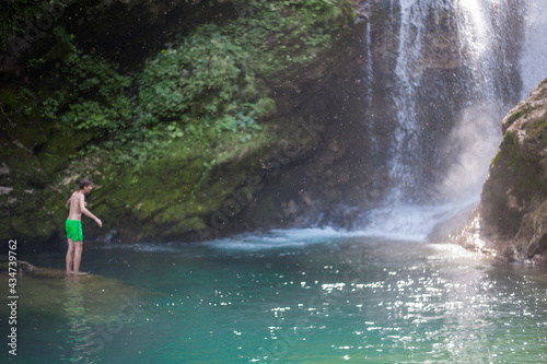 Fototapeta Naklejka Na Ścianę i Meble -  turquoise crystal clear water of a waterfall of a mountain Alpine river