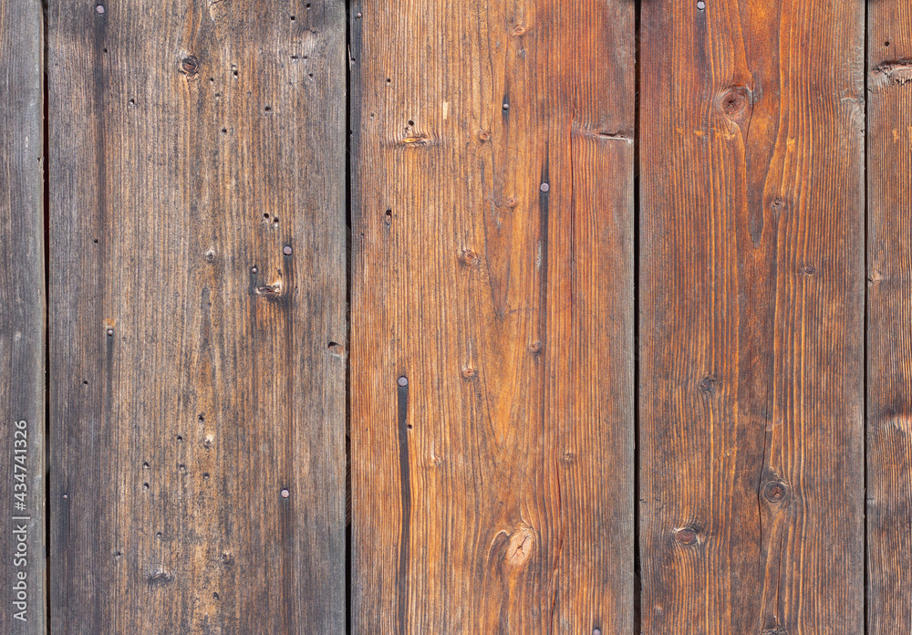 wooden background, old village fence with slits and nails. wooden background, old village fence with slits and nails.