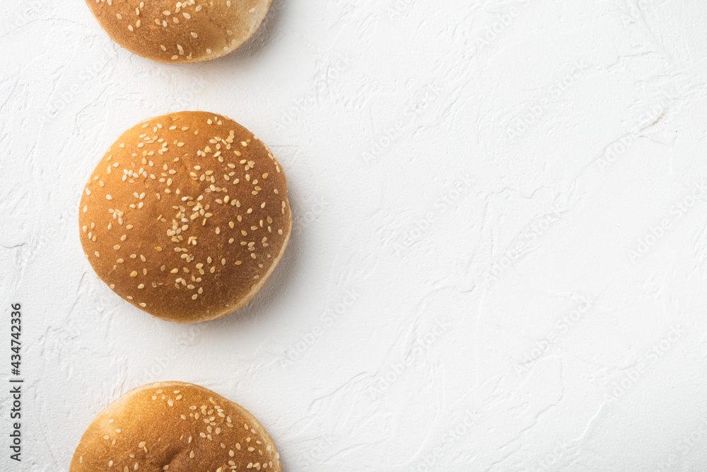 Burger round buns for making fast food sandwiches, on white stone  background, top view flat lay, with copy space for text