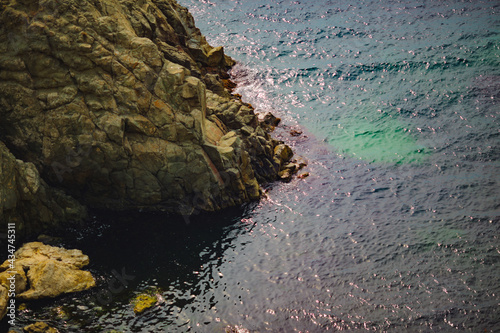 Stones and blue water, coast Azov sea, Crimea
