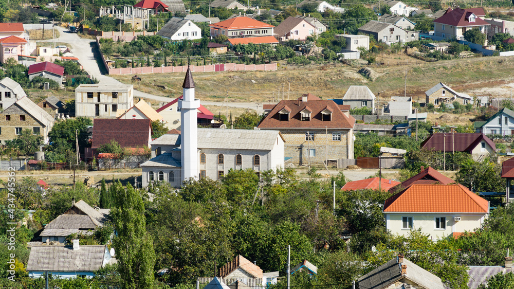Veseloe village near Sudak. View of village on the Black Sea coast on sunny autumn day. Veseloe, Crimea, Russia – October 1, 2019 Veseloe village near Sudak. View of village on the Black Sea coast on sunny autumn day. Veseloe, Crimea, Russia – October 1, 2019
