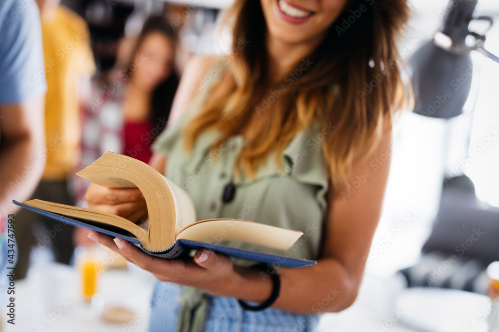People, knowledge, education and school concept. Happy student girl with book People, knowledge, education and school concept. Happy student girl with book