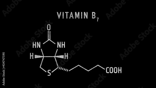 Biotin also called vitamin H or Vitamin B7 Molecular Structure Symbol Sketch or Drawing on black background photo