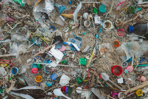 Garbage on the beach. Dirty sea sandy. Trash on beach. plastic bottle. Love the world. Pollution of beaches and sea