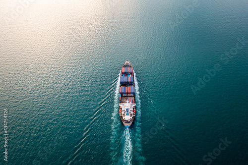 Container ship or cargo shipping business Service logistic import and export freight transportation by container ship in open sea, © SHUTTER DIN
