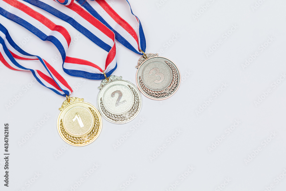 Gold, silver and bronze sports achievement medals for first, second and ...