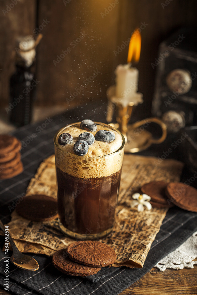 cup of coffee with cinnamon and anise cup of coffee with cinnamon and anise