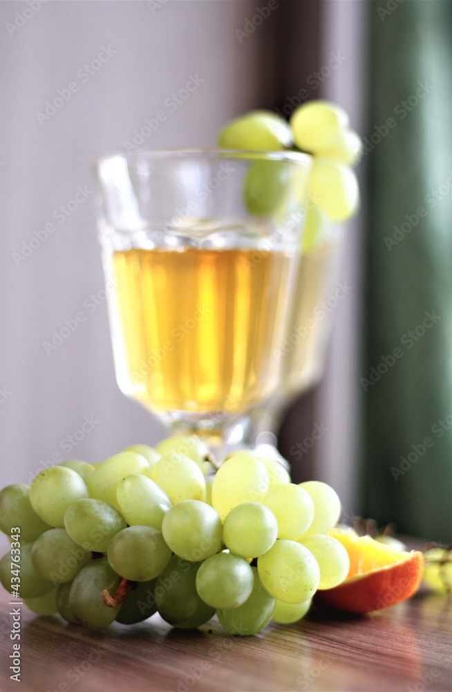 grapes and white wine on the table bar drinks