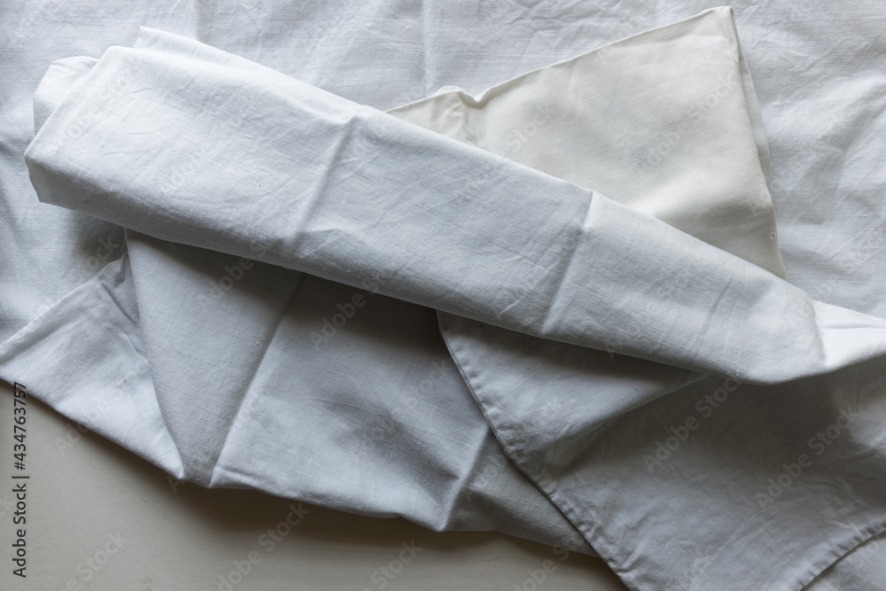 white cotton fabric - low key ambient lighting white cotton fabric - low key ambient lighting