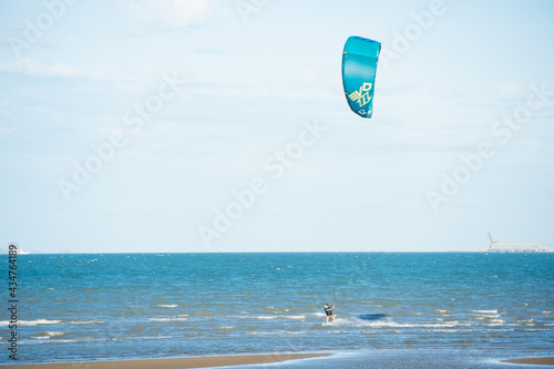 Kiteboarders catching some waves on a Queensland Beach in Australia