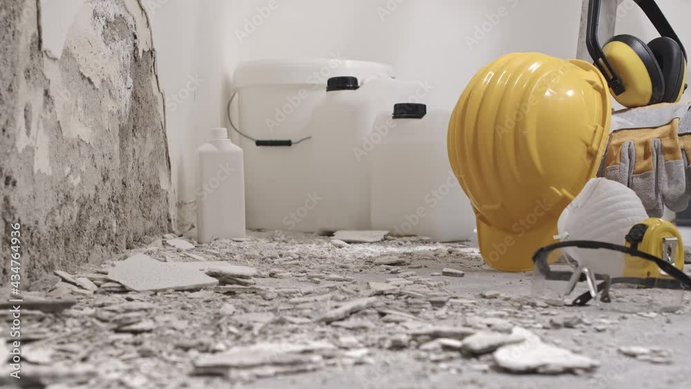 house renovation concept, wall in demolition with plaster rubble and