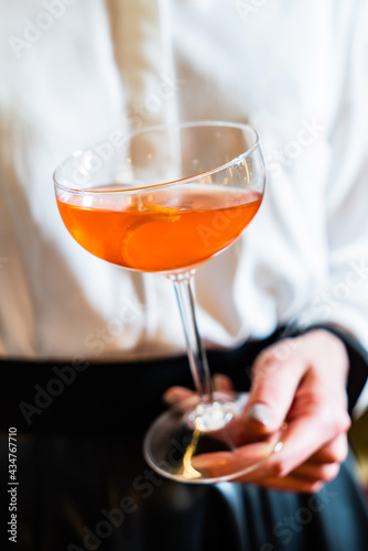 mocktail in the woman's hands