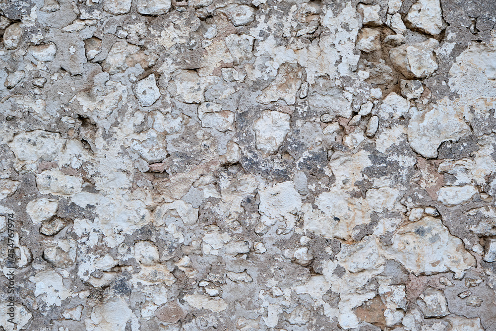 Old traditional white lime wash plaster stone wall texture Old traditional white lime wash plaster stone wall texture