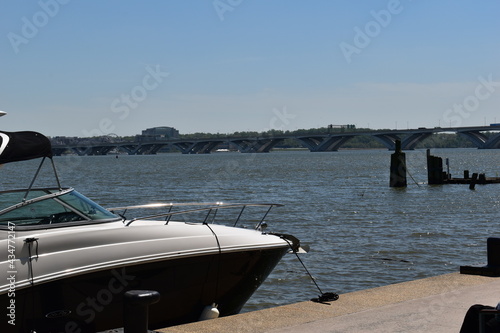 Boat Docked on the Potomac River with the Woodrow Wilson Bridge in the Background